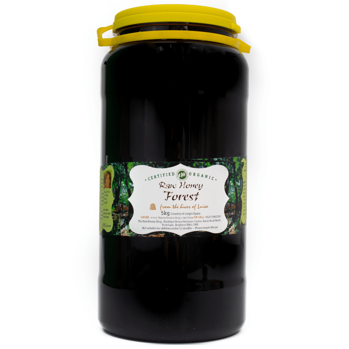A tub of raw organic forest honey with a capacity of 5kg, labeled 'Raw Honey Forest' from the north of Spain.