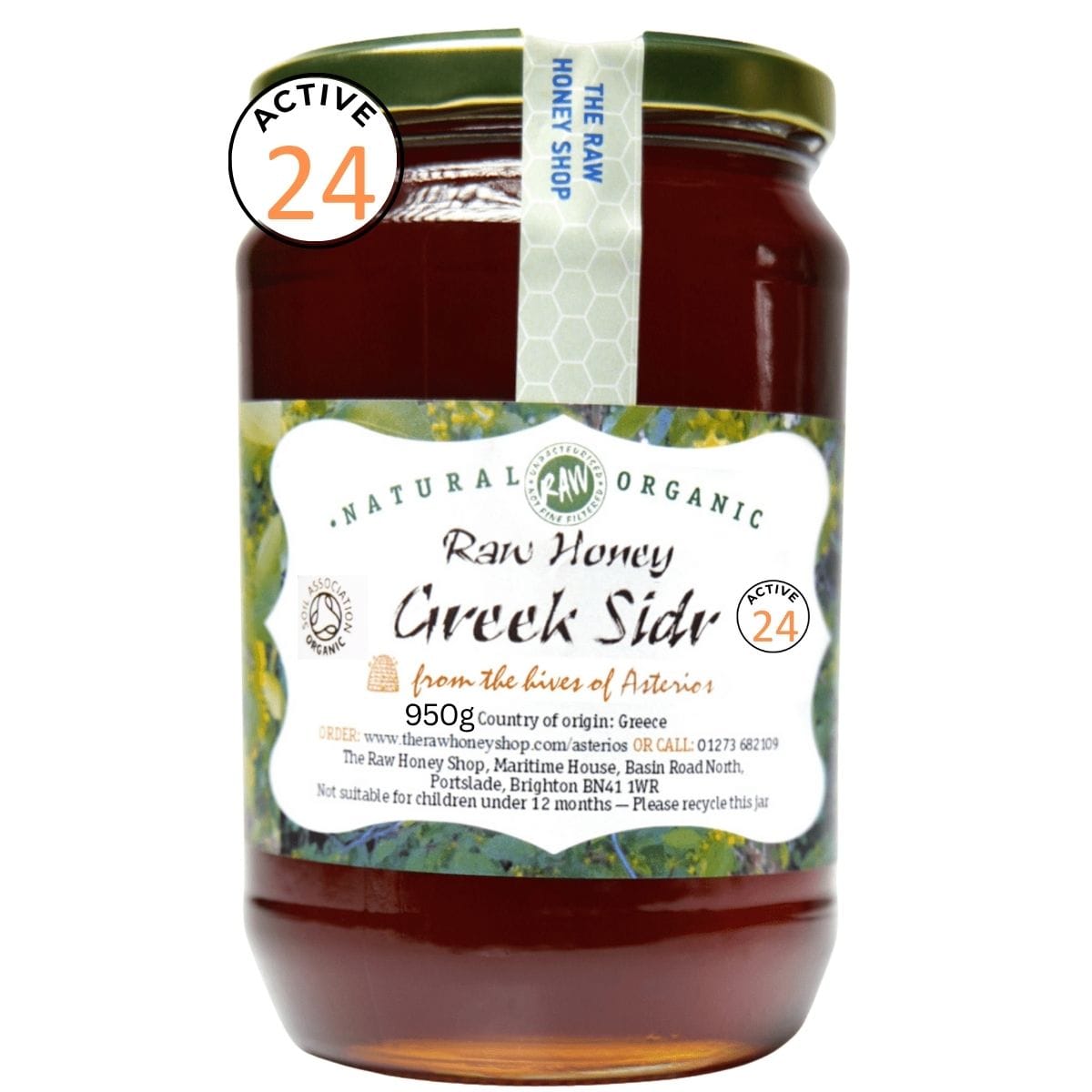 Jar of raw honey with a label on a white background