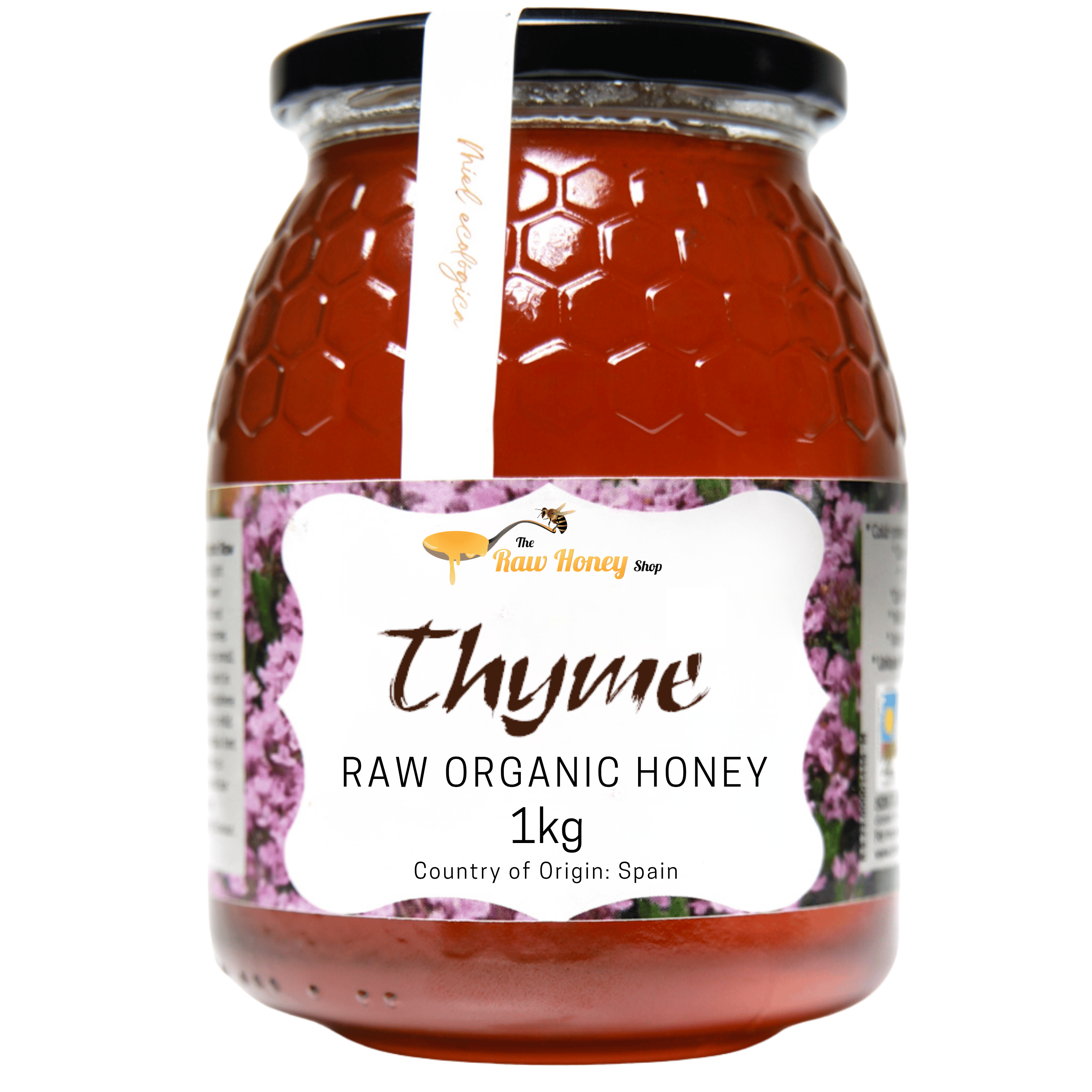 A 1kg glass jar of Antonios Thyme Raw Organic Honey from The Raw Honey Shop with a black lid and a white paper seal, set against a plain white background.