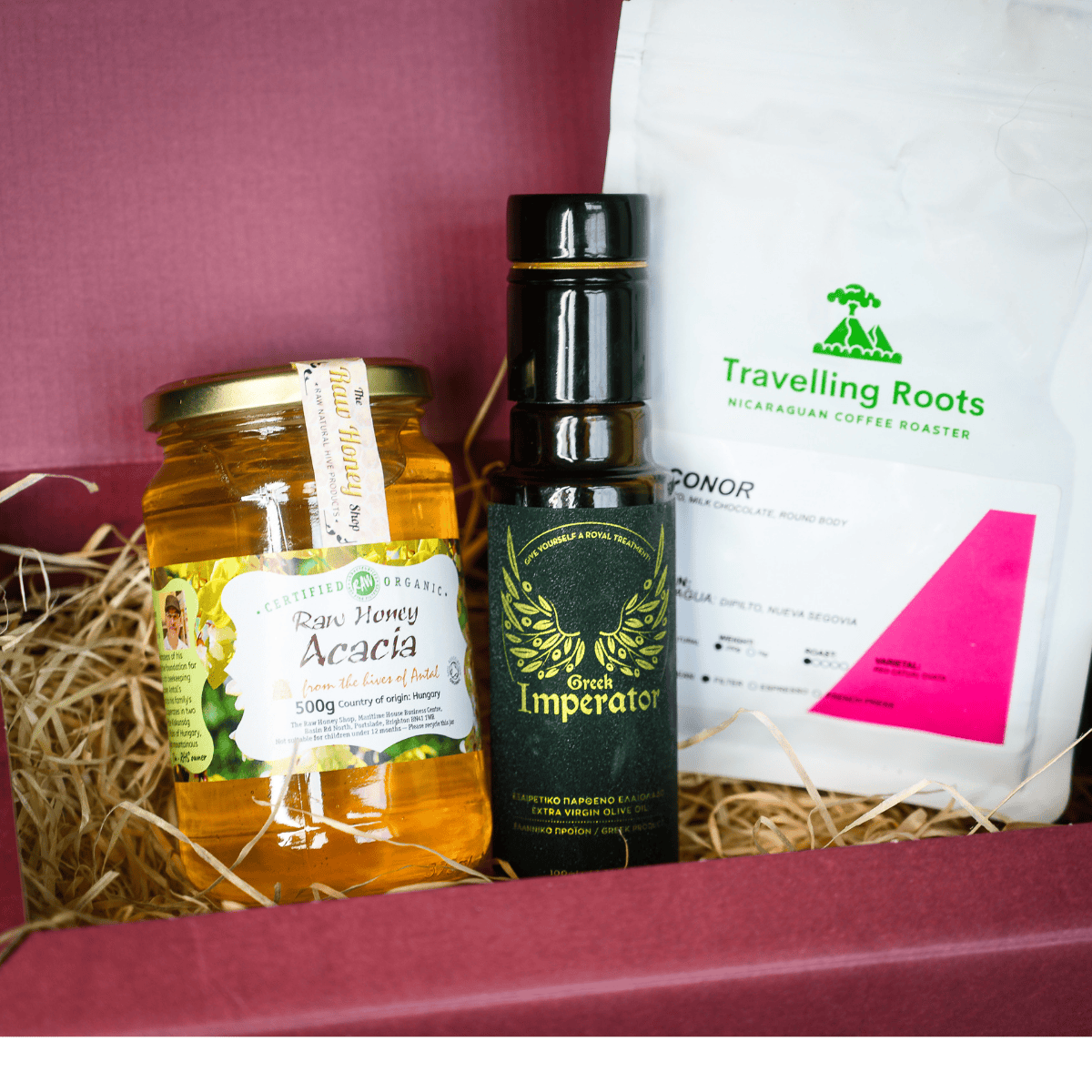 Gift set with honey, olive oil, and coffee in a box