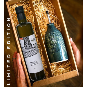 Two bottles in a box labeled 'Limited Edition' with one being organic olive oil.