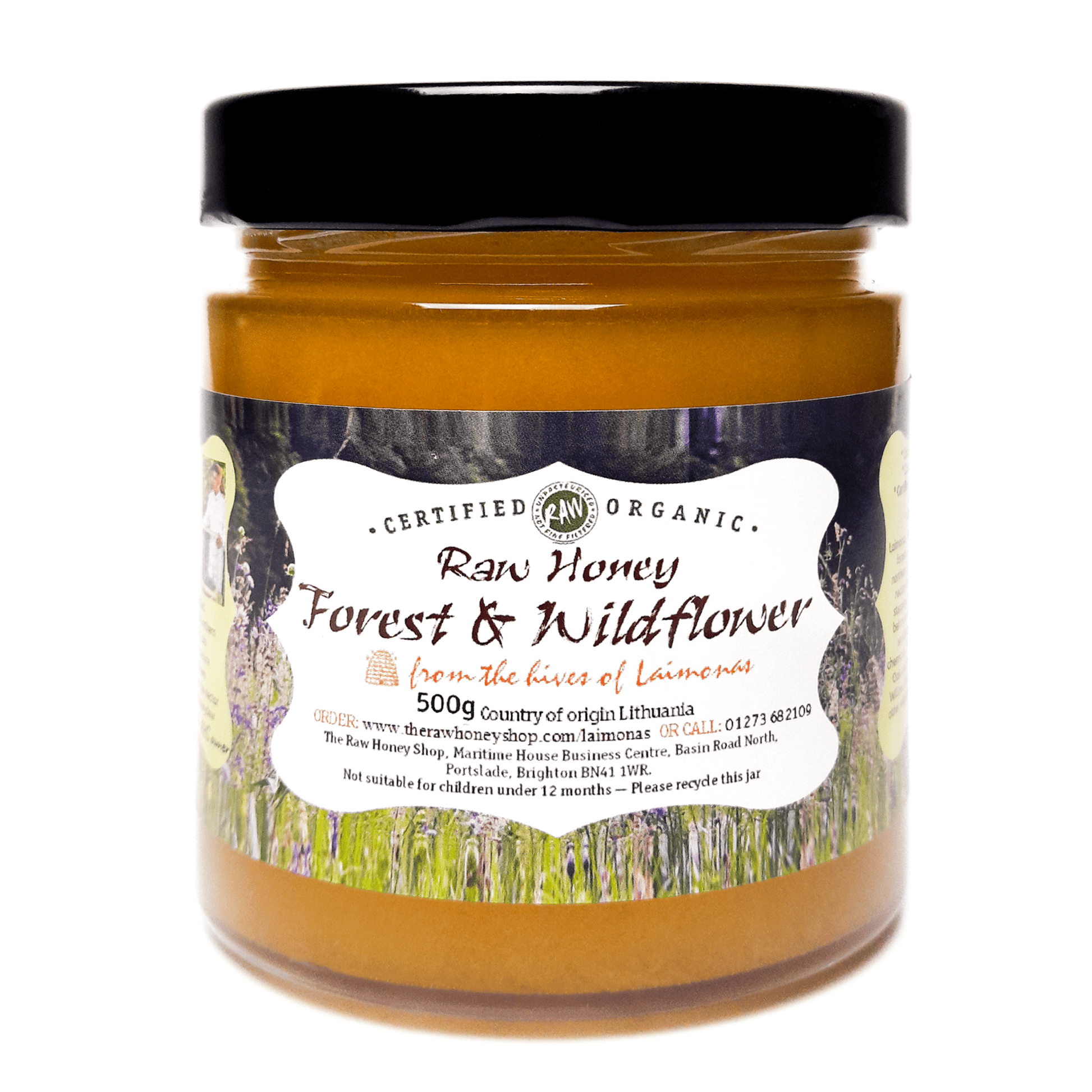 Glass Jar containing 500g of Forest and Wildflower Organic raw honey.