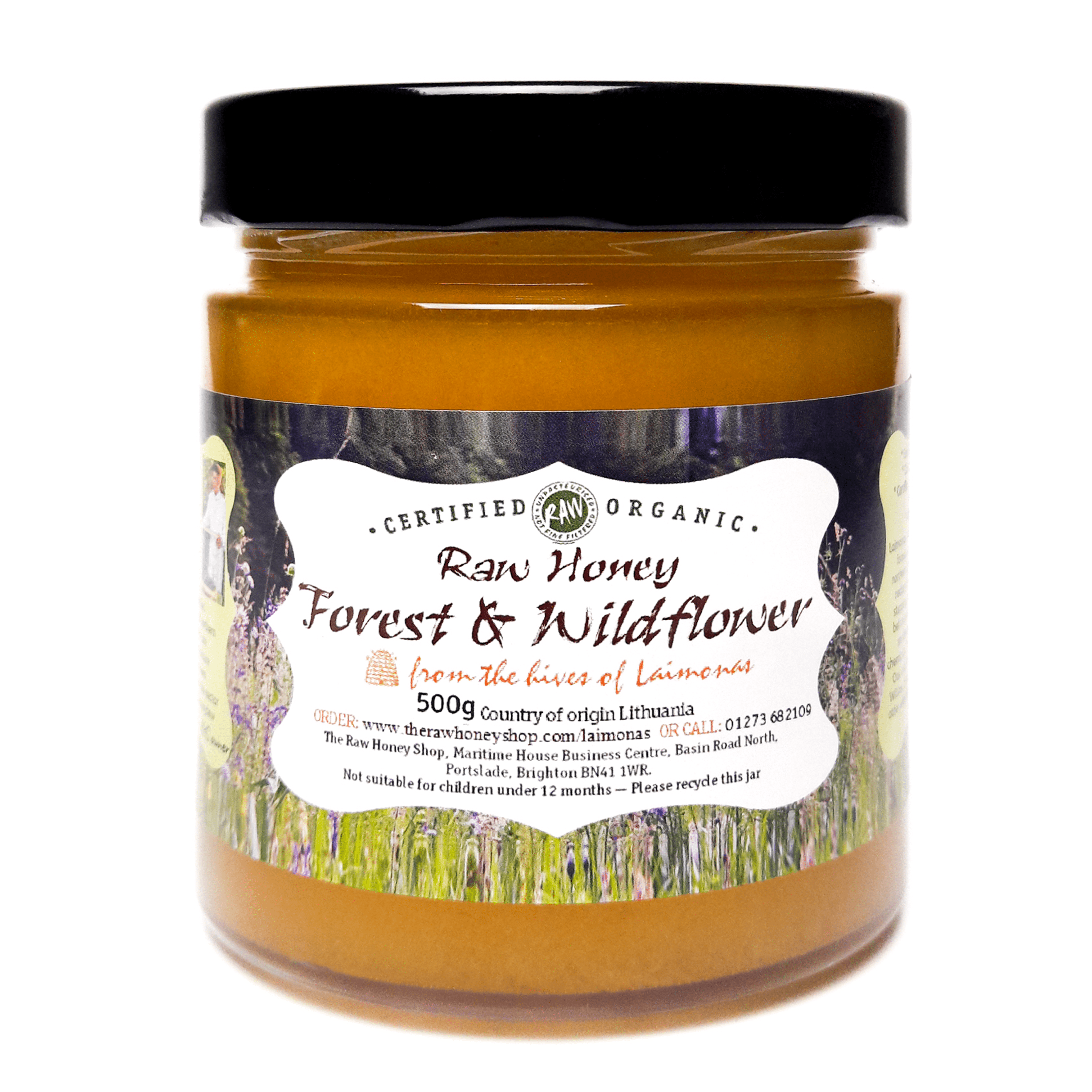 Glass Jar containing 500g of Forest and Wildflower Organic raw honey.