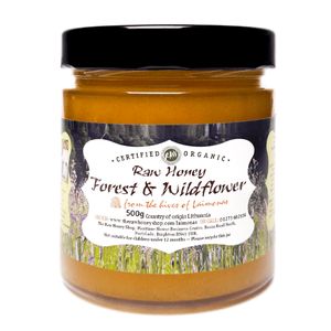 Glass Jar containing 500g of Forest and Wildflower Organic raw honey.