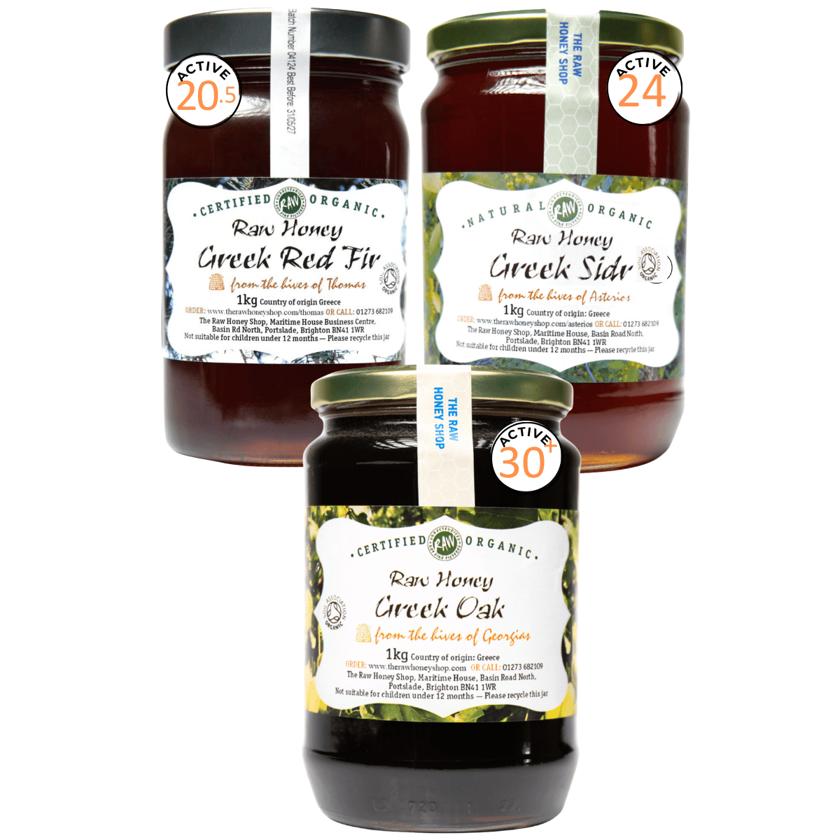 Three jars of raw honey with labels on a white background