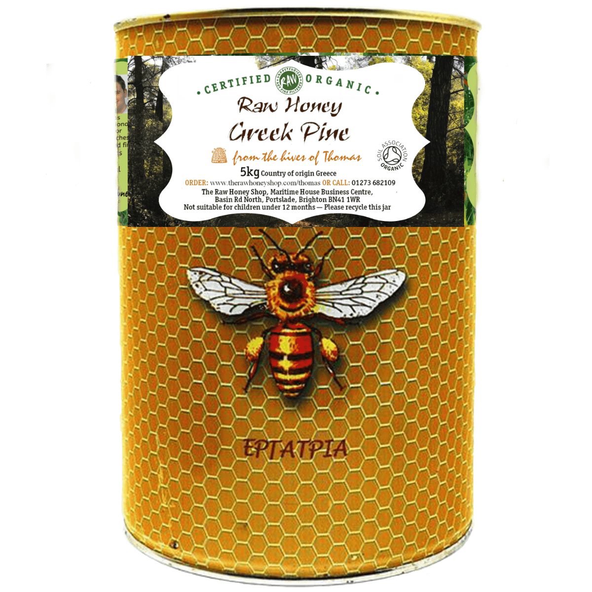 Tin with honeycomb patten and bee to front with label with text Raw Honey Greek Pine.