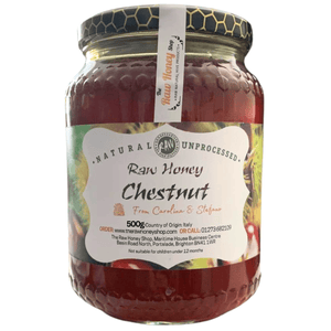 Jar of chestnut honey with a label on a white background