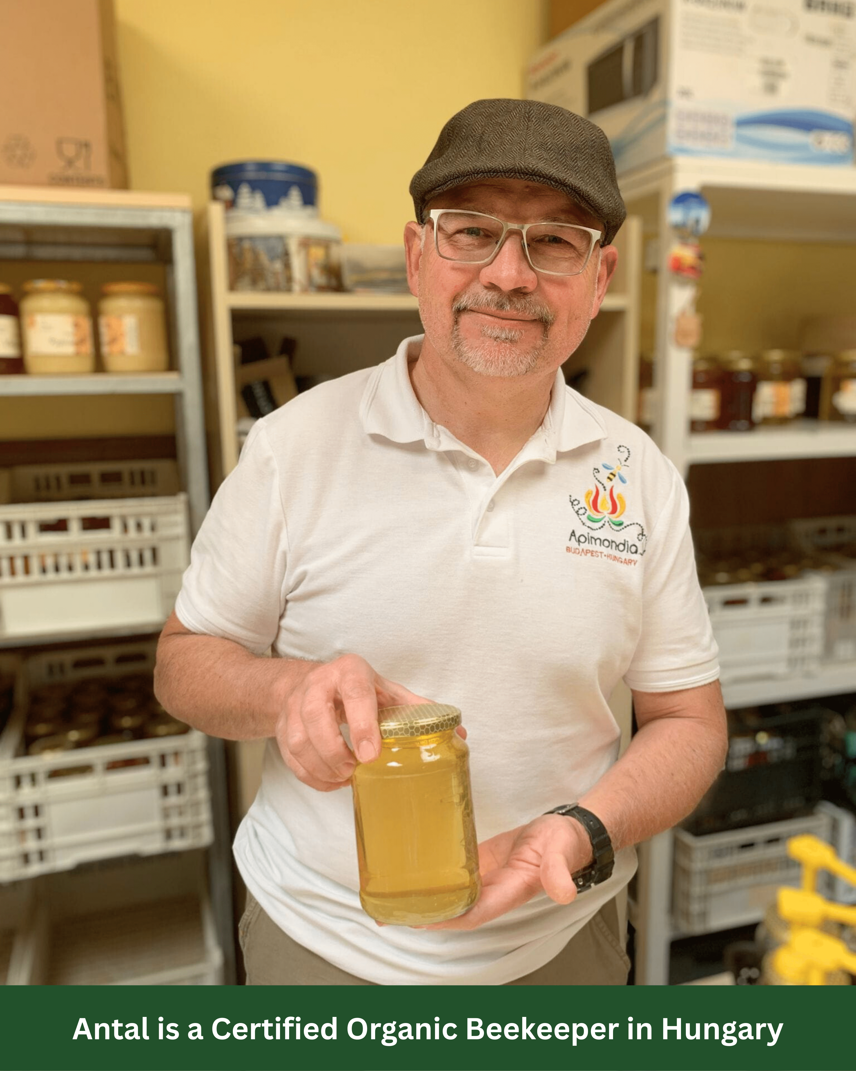 Beekeeper Atal holding a jar of his raw organic Acacia honey.
