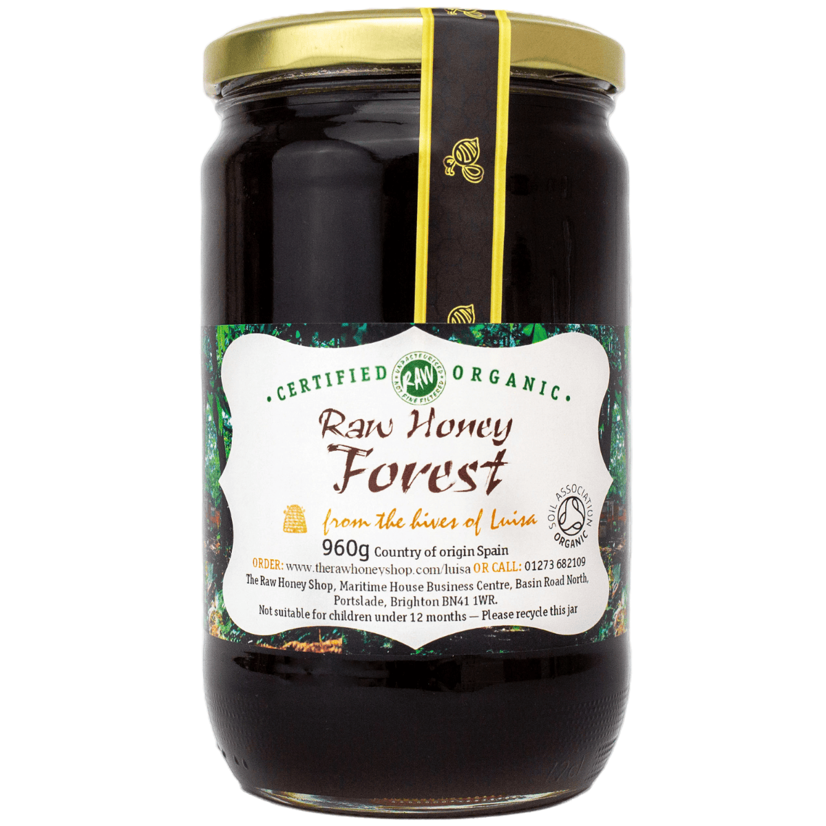 Black honey in a glass jar with a white label,
