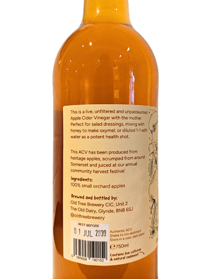 Bottle of Apple Cider Vinegar with a label on a white background