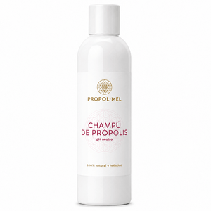 A white bottle of Propol-Mel Champún de Propolis pH neutro shampoo, featuring a white cap and a clean white label with gold and pink text, set against a plain white background.