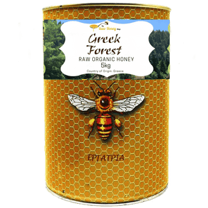 A 5kg metal tin of Thomas' Greek Forest Raw Organic Honey, featuring a golden honeycomb pattern with an illustration of a honeybee on the front label.