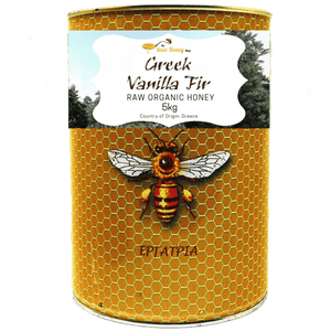 A 5kg metal tin of Thomas' Greek Vanilla Fir Raw Organic Honey, featuring a golden-yellow honeycomb pattern, a central illustration of a honeybee, and a white label at the top.