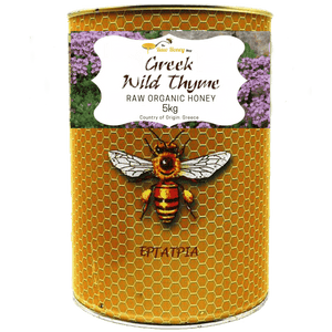 A 5kg metal tin of Thomas' Greek Wild Thyme Raw Organic Honey, featuring a golden-yellow honeycomb pattern, a central illustration of a bee, and a white label at the top.