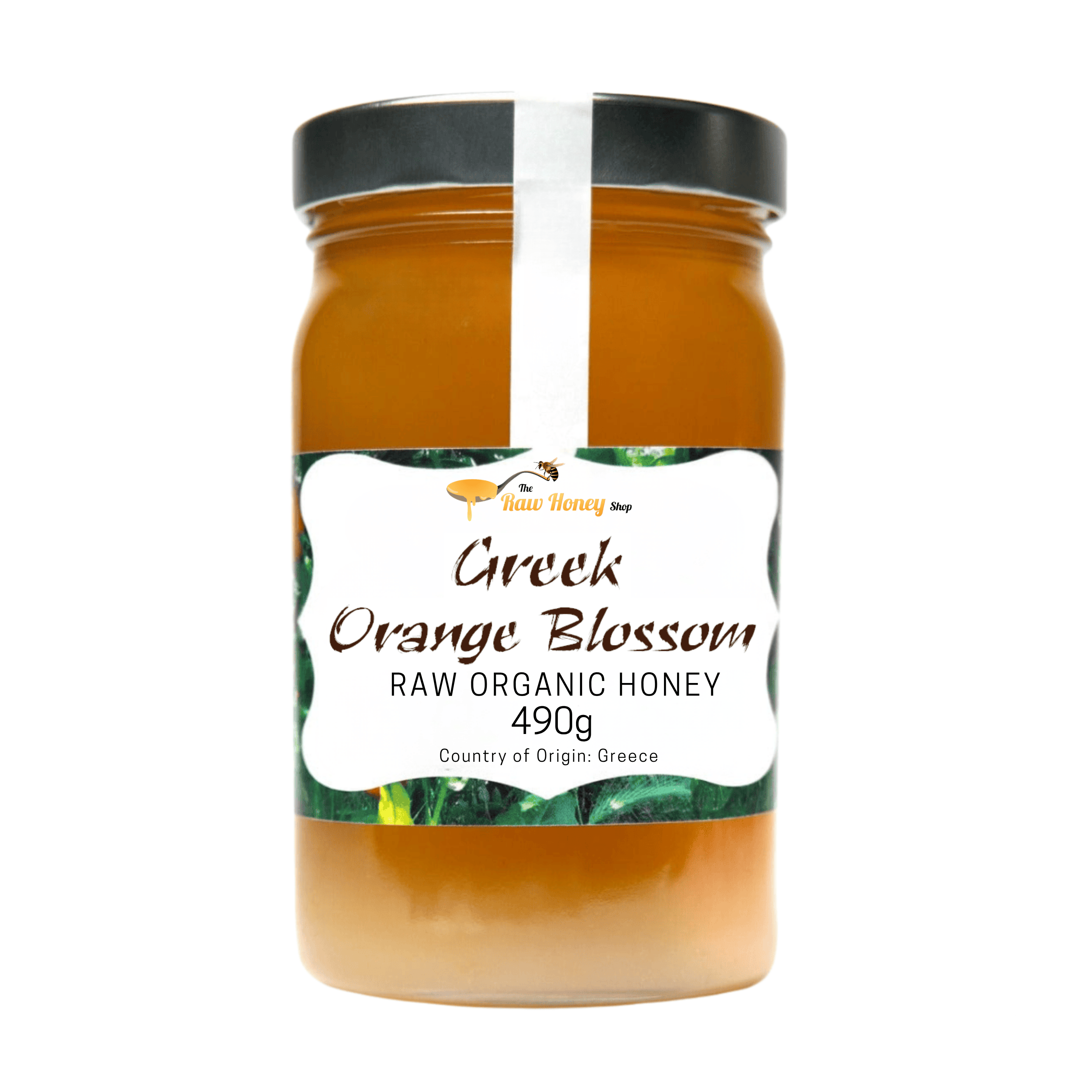 A jar of Greek Orange Blossom Raw Organic Honey from The Raw Honey Shop, featuring a black lid and a white label with green accents, set against a plain white background.