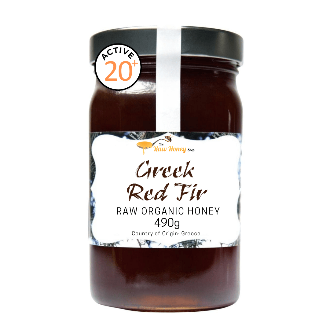 A jar of New Honey Co. Greek Red Fir Raw Organic Honey, 490g, with a black lid and a white label, shown on a plain white background with an 'ACTIVE 20+' badge.