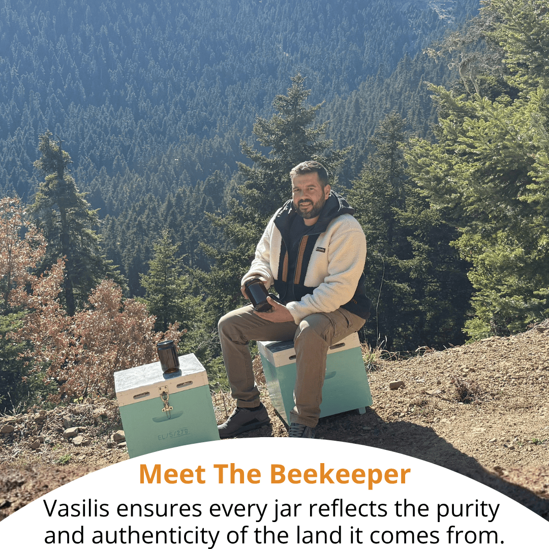 A man sits on a mint green beekeeper cooler in a forested mountain setting, holding a jar lid. Another mint green cooler with a jar sits beside him.