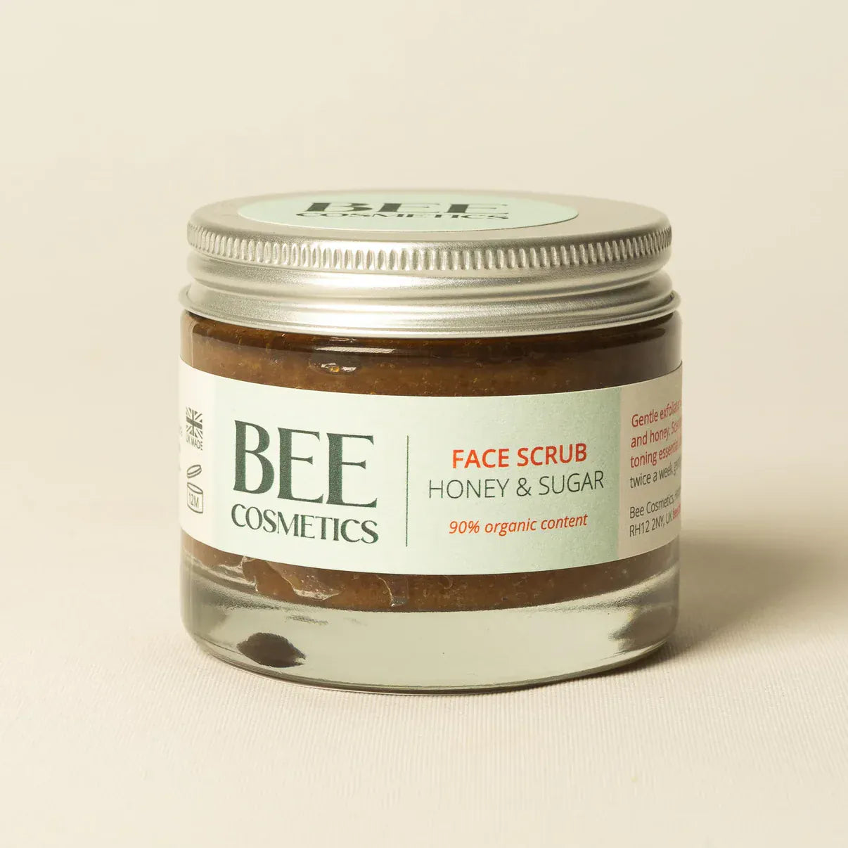 Glass jar of Bee Cosmetics Honey & Sugar face scrub.