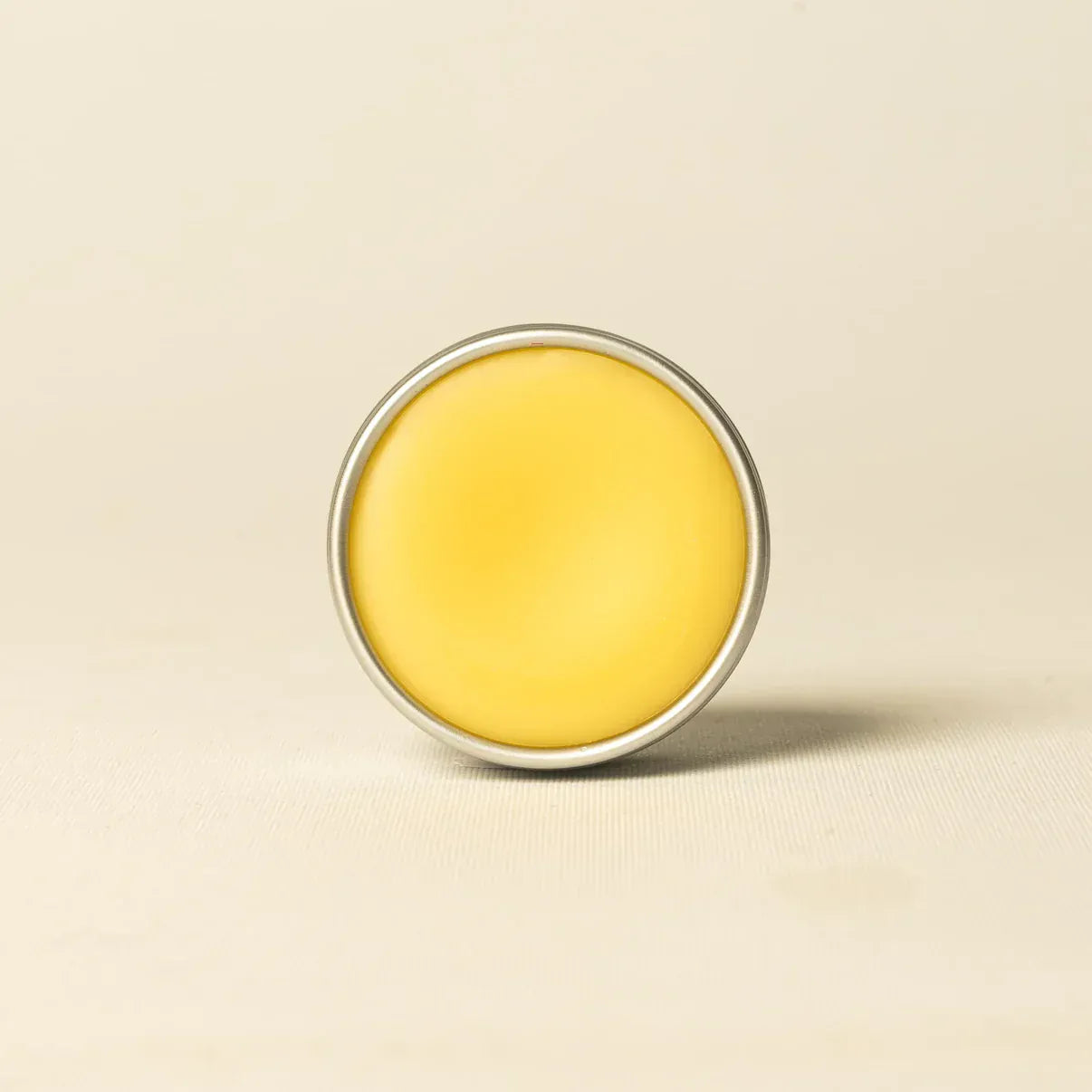 Tin of Bee Cosmetics Lip Balm.
