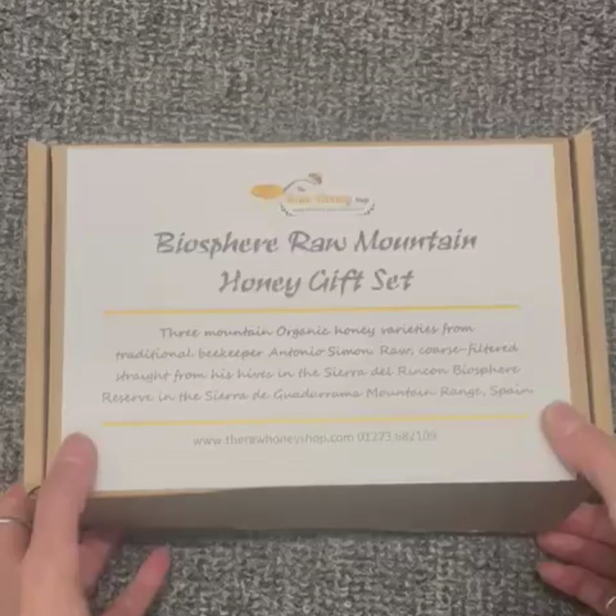 Video of gift box being opened and showing 3 jars of honey.